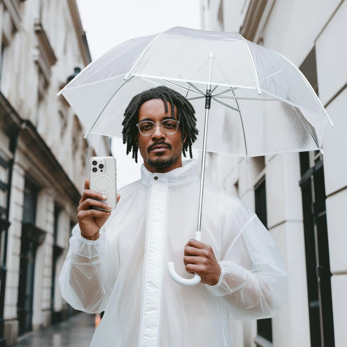 ZAGG campaign character with a clear umbrella and a transparent phone case